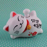 Lucky cat - Maneki Neko - Waving cat lying solar - white